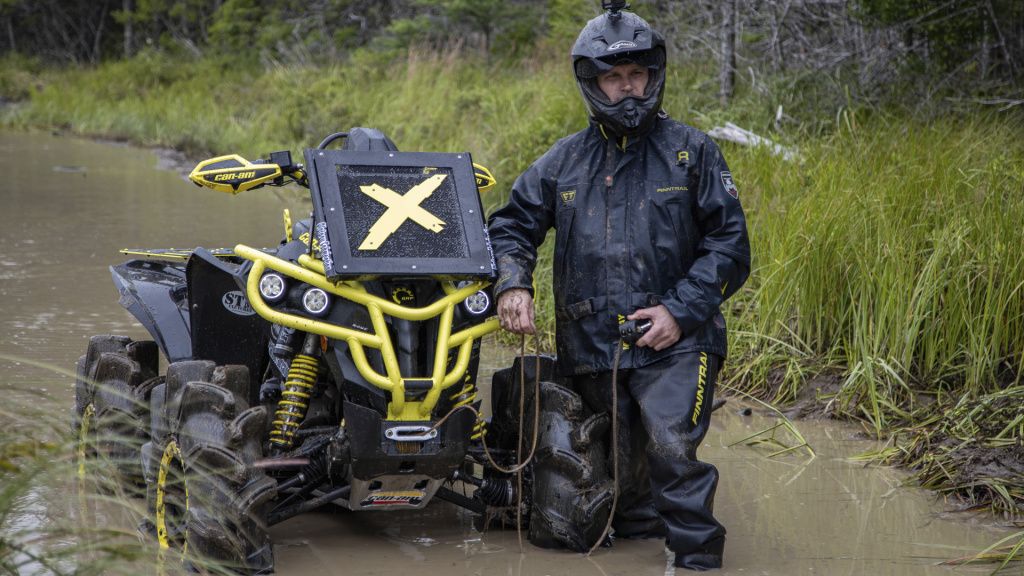 man and atv