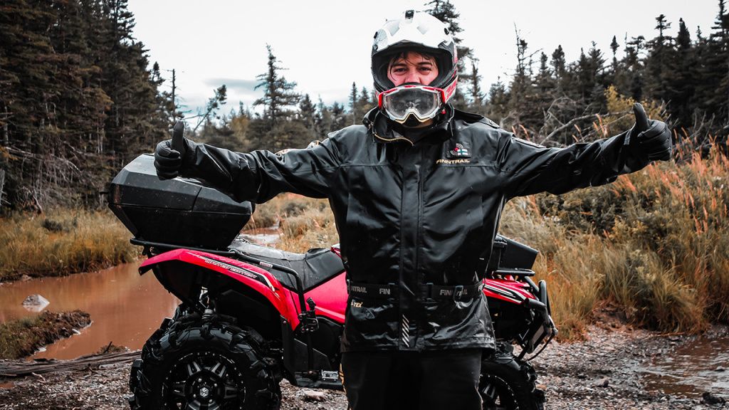 rider in waterproof atv gloves