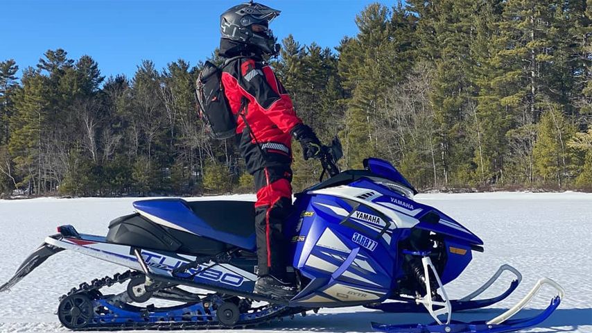 man on yamaha snow rider