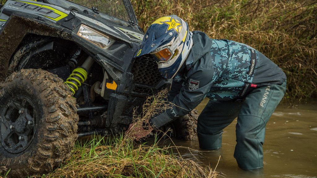 man with utv winch