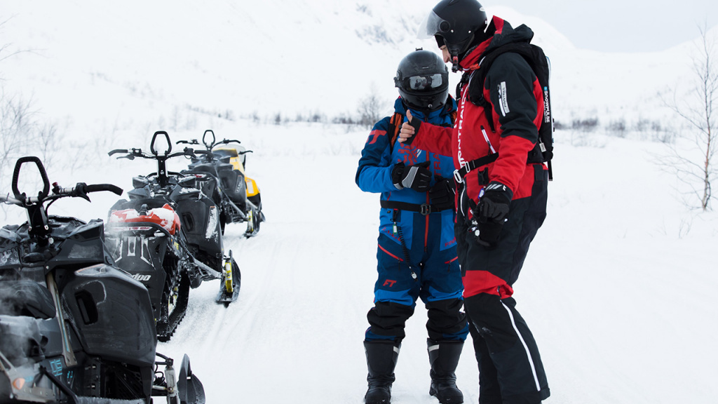 snowmobile riders