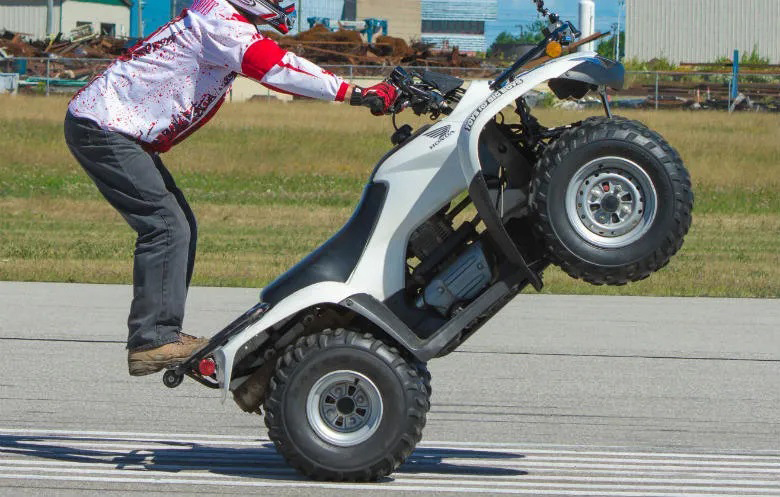 longest backwards wheelie in distance on an atv