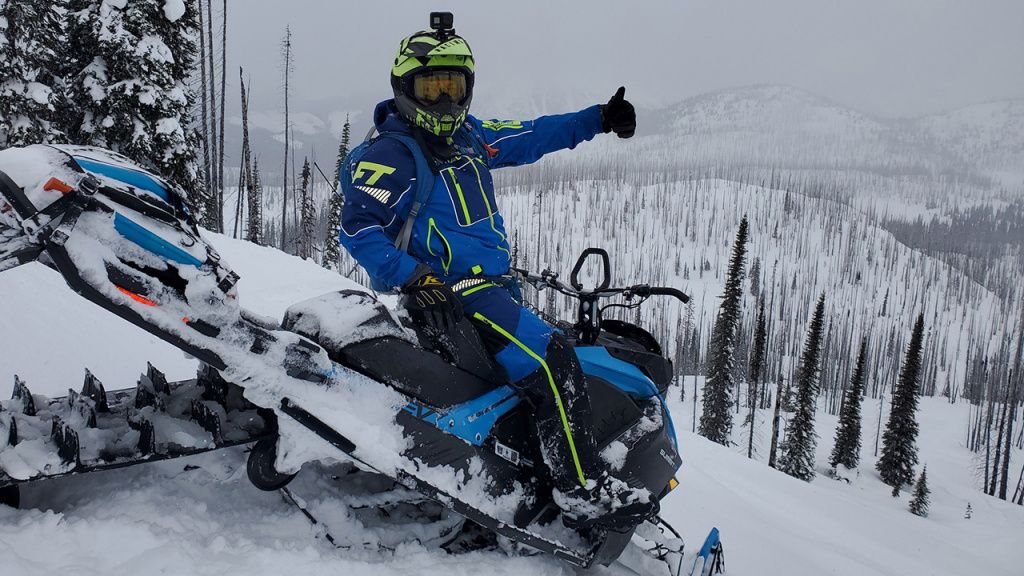 man snowmobile rider