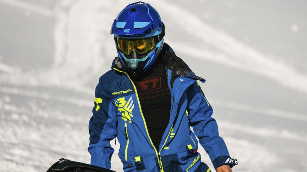 slope snowmobile rider