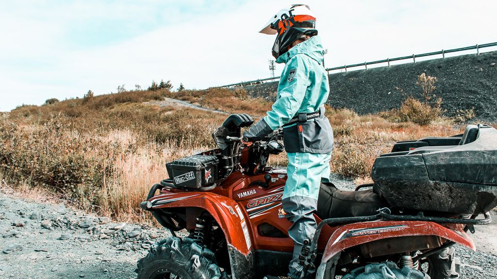trail riding girl yamaha grizzly.jpg