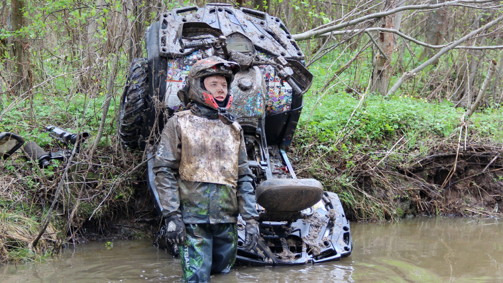 damaged atv in mud
