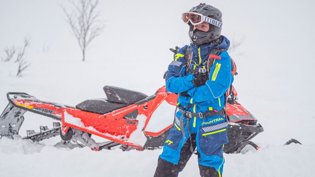 snowmobile and man